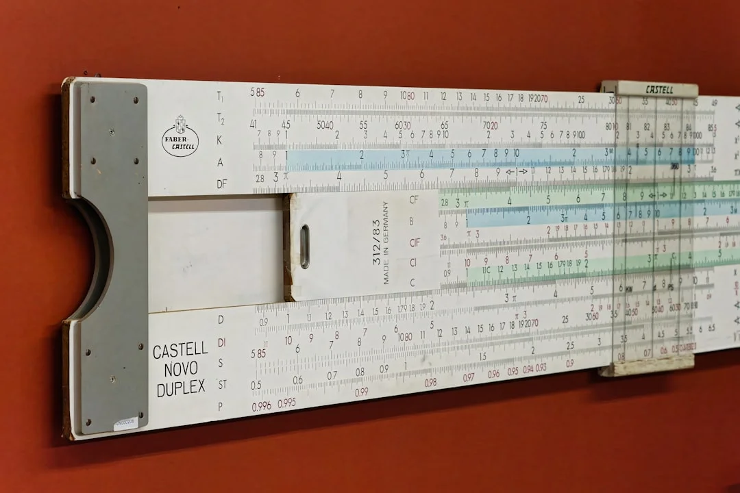 A large ruler mounted to the side of a wall