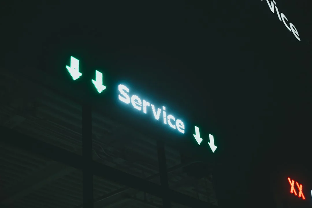 a lit up sign that says service i and x